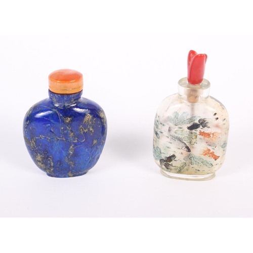 153 - A Chinese carved lapis lazuli snuff bottle, decorated with a bird on a branch to one side and figure... 