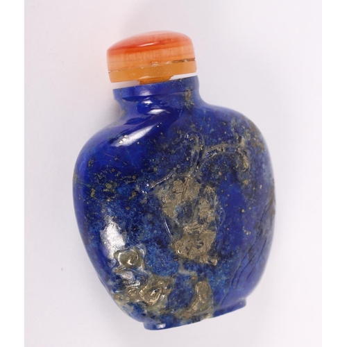 153 - A Chinese carved lapis lazuli snuff bottle, decorated with a bird on a branch to one side and figure... 