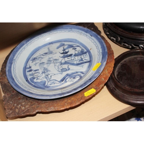 158 - A quantity of hardwood stands and vase covers, a Chinese blue and white dish and a soapstone dish