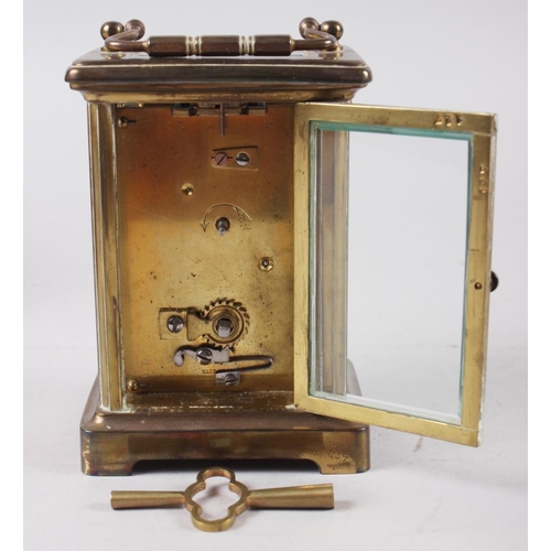 176 - A French brass and glass cased carriage clock with travel case, 4 1/2