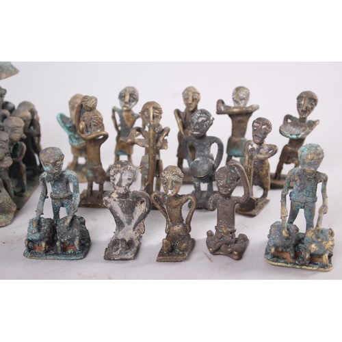 208 - A collection of Ashanti bronze gold weight figures