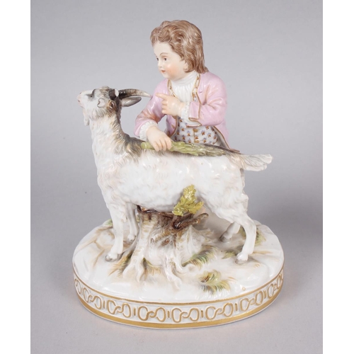 232 - A 19th century Meissen figure of a child with a goat, on oval base, 6