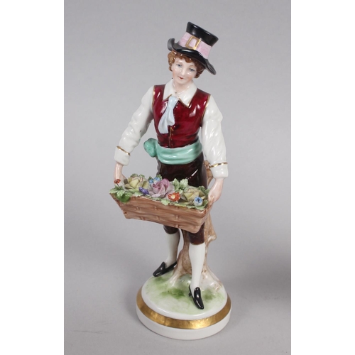 232 - A 19th century Meissen figure of a child with a goat, on oval base, 6