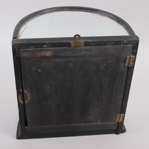 269 - An ebonised bowfront display case, 11 1/2