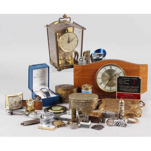 276 - A quantity of lighters, clocks, watches, cigarette cards and other miscellaneous items