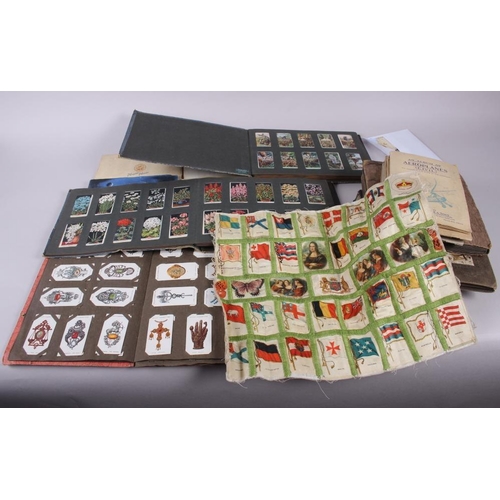 299 - A collection of Players and Wills cigarette cards, loose, in albums and in slip covers, including fi... 