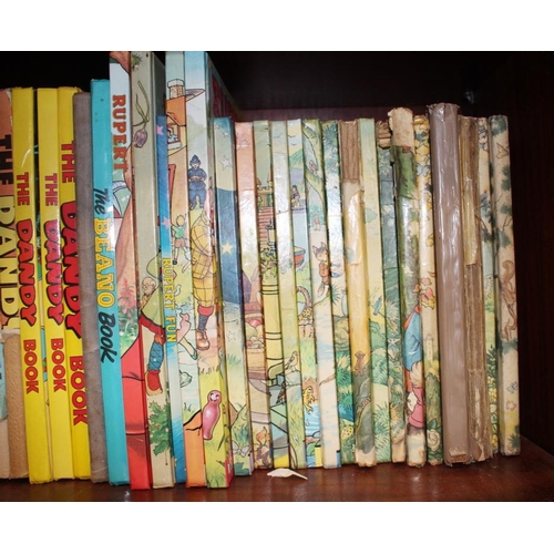 303 - A collection of Rupert Annuals, including a 1958 copy, and other annuals including Beano, Dandy and ... 