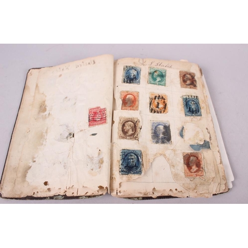 304 - A late 19th century album of world stamps (stuck down) and 