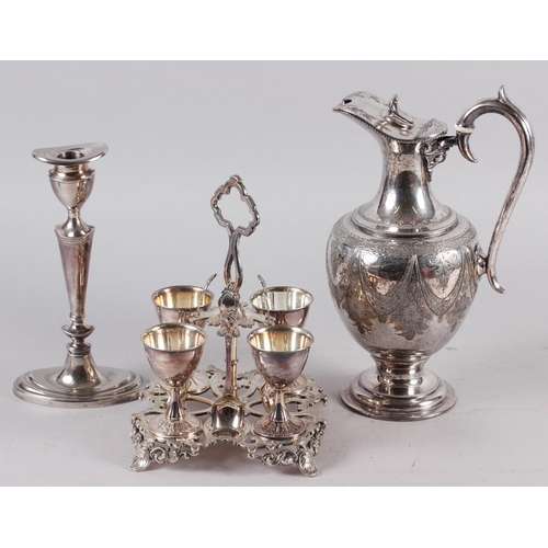 306 - A Victorian silver plated egg cup stand with four cups and spoons, an oval plated candlestick, a pla... 