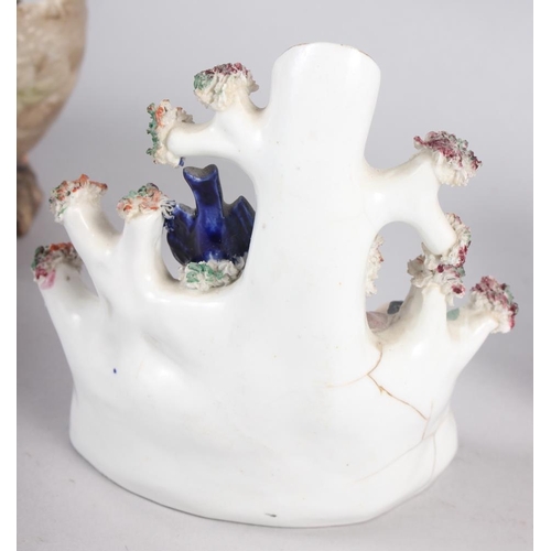 31 - A pair of continental porcelain spill vases, formed as swans with cherubs, 3 1/2