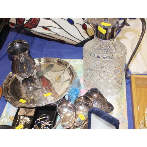 310 - A silver plated salver, a plated cream jug, a pair of filled silver candlesticks and other plate, et... 