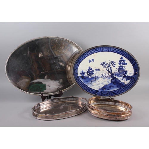 314 - Two oval gallery trays, a similar with ceramic base and other trays