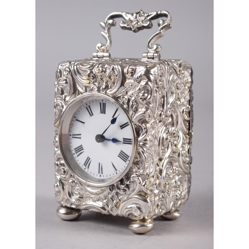 327 - A late Victorian silver cased miniature carriage clock with embossed Rococo decoration, white enamel... 