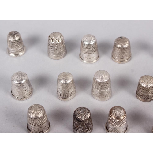 329 - A collection of approximately twenty-eight silver thimbles, by Charles Horner and others