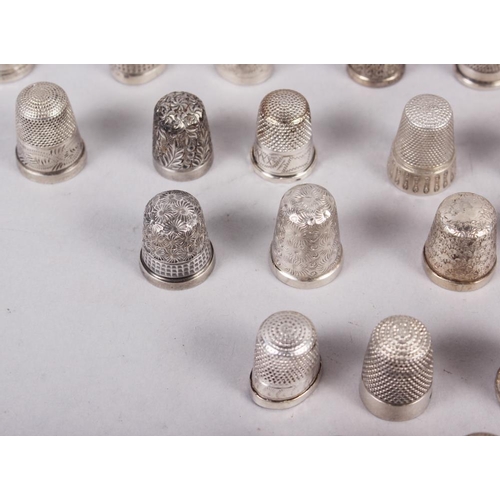 329 - A collection of approximately twenty-eight silver thimbles, by Charles Horner and others