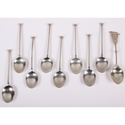 332 - A set of six silver coffee spoons with pierced handles, a set of eight silver teaspoons one other sp... 