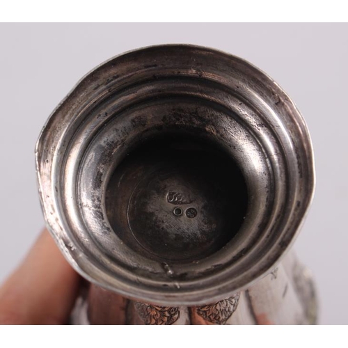 345 - A Middle Eastern white metal fluted vase with engraved decoration, 5 1/4