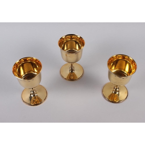 349 - Three silver gilt goblets, by William Comyns & Sons Ltd, 5