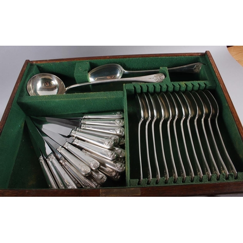 357 - A suite of silver cutlery for twelve (one teaspoon missing) and associated silver handled knives wit... 