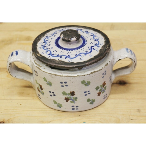 37 - An 18th century Delft ware two handled posset pot and associated cover with white metal mounts, 8 1/... 