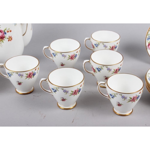 70 - An Old Royal Bone China sixteen piece coffee set with floral decorated borders