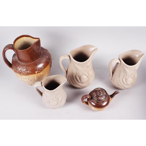 75 - A stoneware hunting jug, 8 3/4