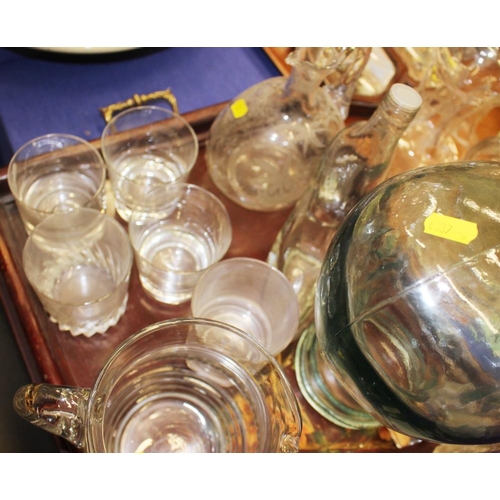 79 - A Victorian cut glass claret jug, three decanters, four custard cups and other glassware