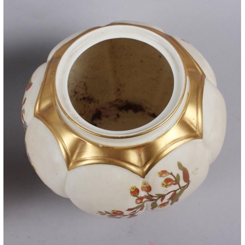 85 - A Royal Worcester blush ivory pot pourri pot and cover and a similar companion, 7 1/2