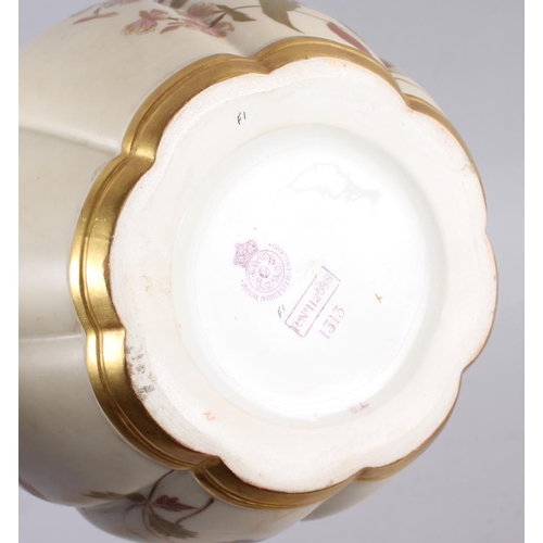 85 - A Royal Worcester blush ivory pot pourri pot and cover and a similar companion, 7 1/2