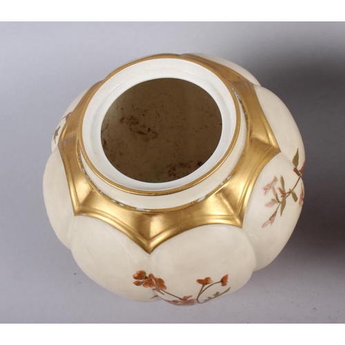 85 - A Royal Worcester blush ivory pot pourri pot and cover and a similar companion, 7 1/2