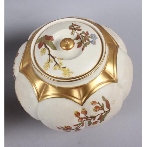 85 - A Royal Worcester blush ivory pot pourri pot and cover and a similar companion, 7 1/2