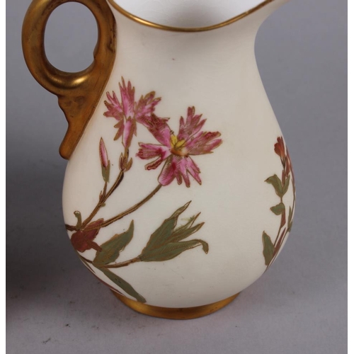 87 - Three Royal Worcester blush ivory jugs, decorated floral sprays, largest 8 1/4