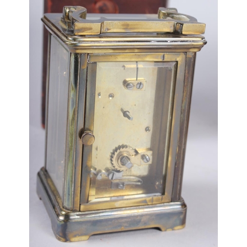 161 - A brass cased five-window carriage clock with white enamel dial and Roman numerals by W Caney, 4 1/2... 