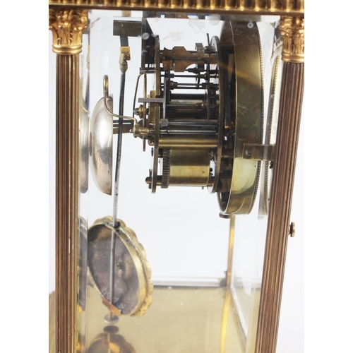 165 - A brass cased four glass mantel clock with white enamel dial and Arabic numerals, on stepped base, 1... 