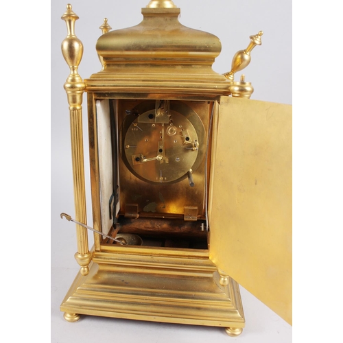 174 - A gilt metal Continental mantel clock with hand-painted porcelain panel, 15 1/4