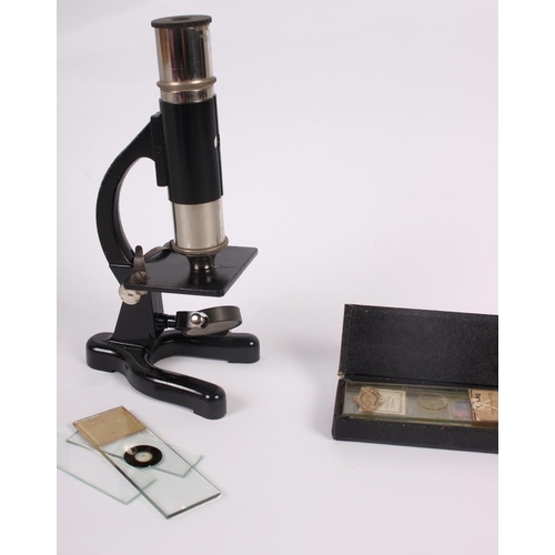 179 - A student's travelling microscope with microscope slides, 6 3/4