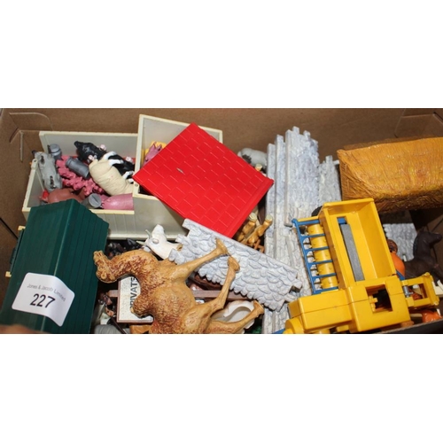 227 - A quantity of Britains farmyard toy accessories, including animals, vehicles and buildings, and a ti... 