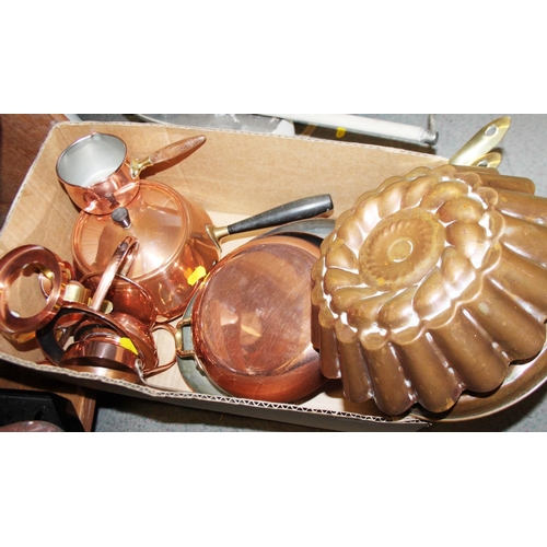 212 - Two copper jelly moulds, a brandy warmer cover and stand, a fondue set and two copper pans