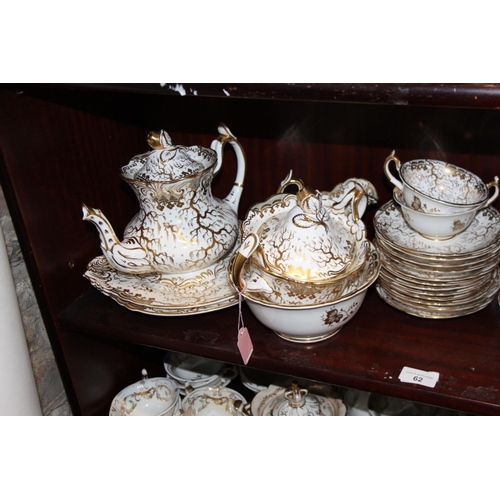 62 - A Rockingham porcelain tea service comprising teapot, slop bowl, lidded sucrier, two cake plates, tw... 