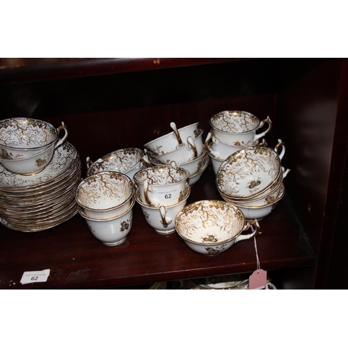 62 - A Rockingham porcelain tea service comprising teapot, slop bowl, lidded sucrier, two cake plates, tw... 