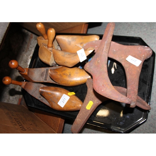 277 - Two pairs of 1930s shoe stretchers and three shoe casts