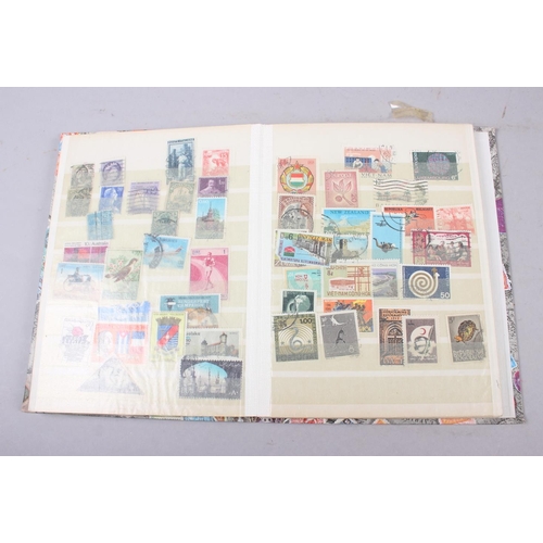 305 - Four albums of British and world stamps, and a collection of loose stamps, covers, etc