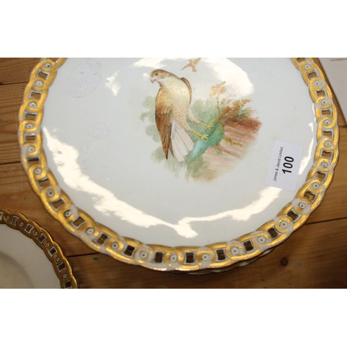 100 - Four 19th century hand-painted tazzas, decorated birds, three matching plates and a miniature dinner... 