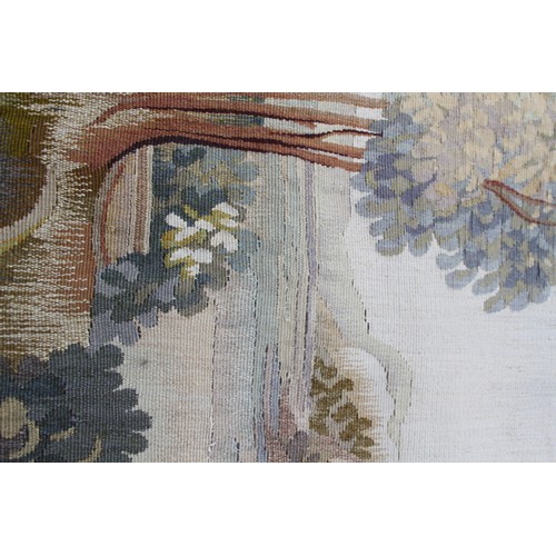 240 - An Aubusson verdure tapestry panel with cottage and castle, 46