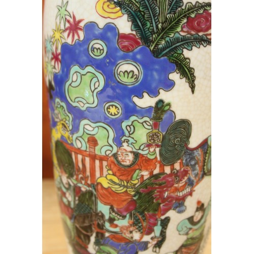 112 - A Chinese polychrome vase, decorated Taoist Immortals, 13 1/2