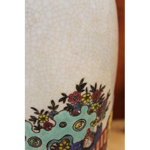 112 - A Chinese polychrome vase, decorated Taoist Immortals, 13 1/2