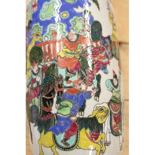 112 - A Chinese polychrome vase, decorated Taoist Immortals, 13 1/2