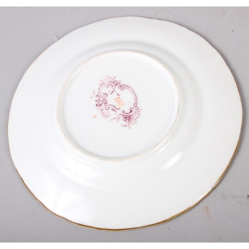10 - Five late 19th century tea plates with floral decoration and green borders, 5 1/2