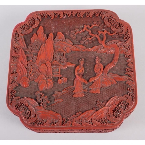 101 - A Chinese carved cinnabar lacquered box, decorated figures in a garden