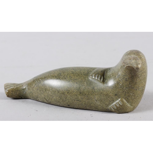 186 - An Inuit carved stone seal, 6